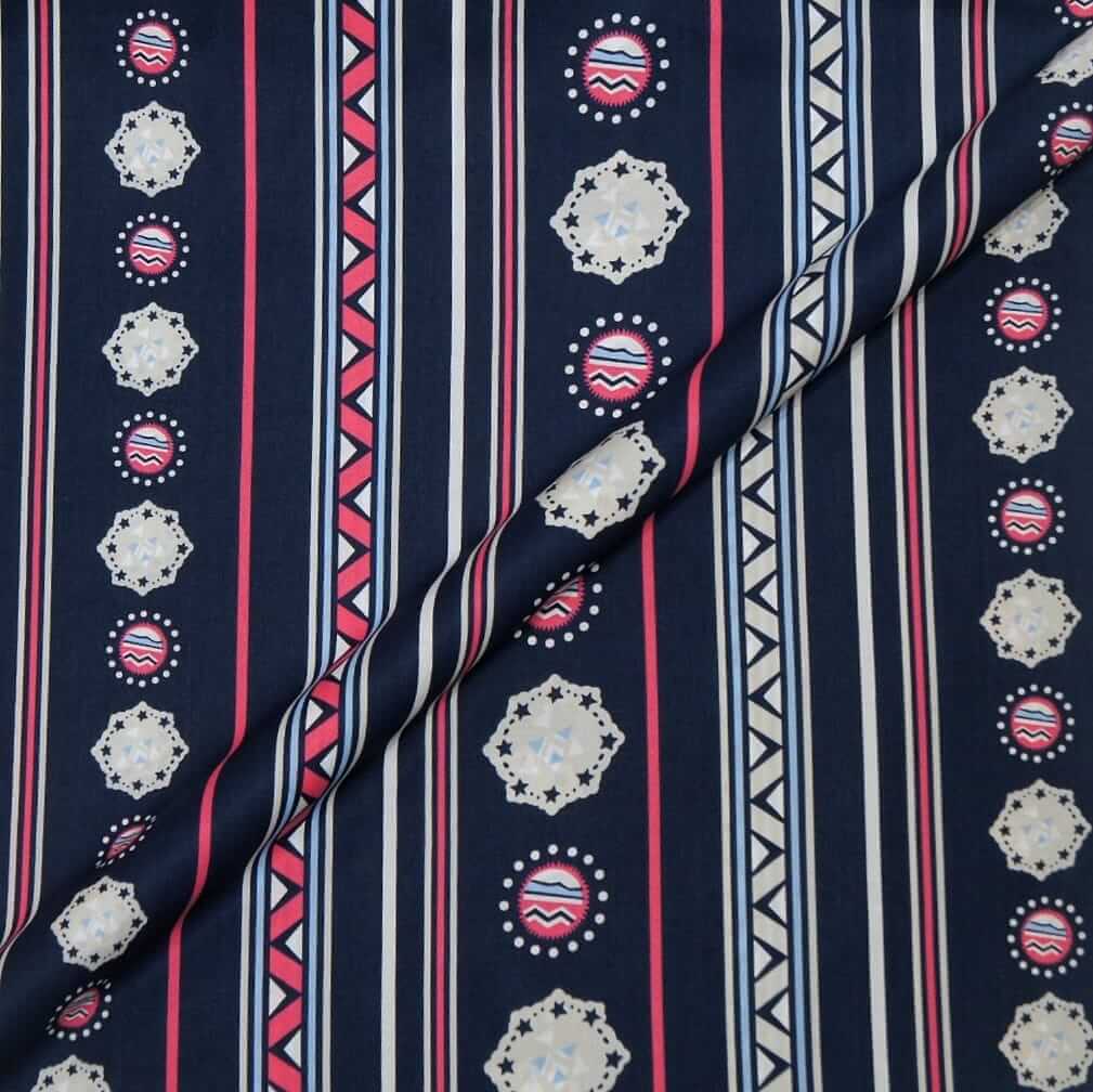 Navy fabric with red, white, and blue geometric patterns