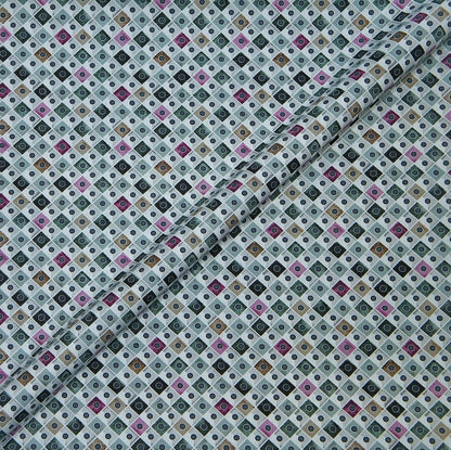 Patterned fabric with small geometric design on a neutral background